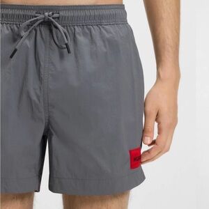 HUGO Charcoal Swim Trunks with Red Logo